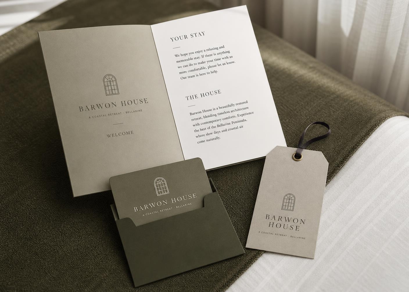 Barwon House welcome booklet, key sleeve and tag on linen